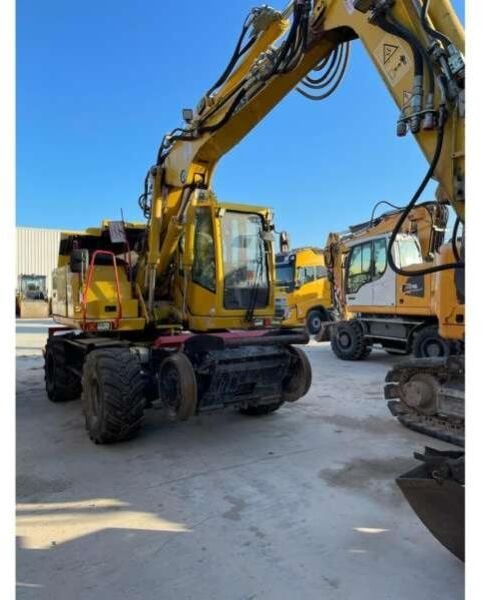 2015 Atlas 1404 M Z wheel excavator, front three-quarter view