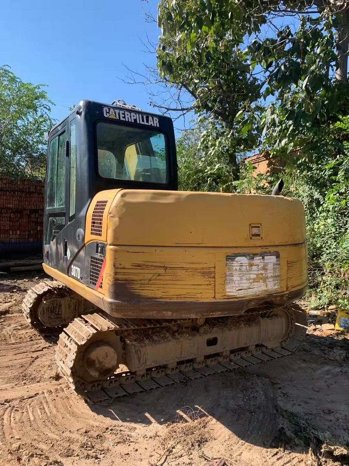 2024 Caterpillar 307D excavator, rear three-quarter view 2024 Caterpillar 307D excavator, rear three-quarter view