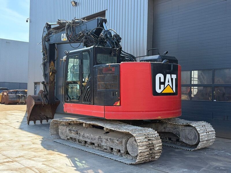 2018 Caterpillar 325FL crawler excavator, rear three-quarter view 2018 Caterpillar 325FL crawler excavator, rear three-quarter view