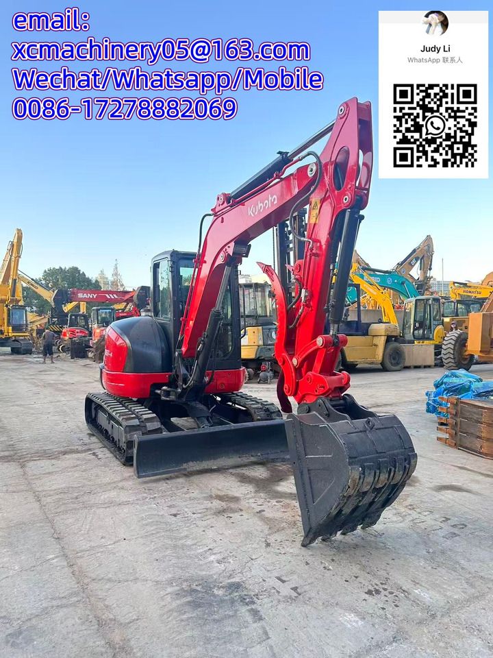 2023 Kubota KX057-4 mini excavator, front three-quarter view 2023 Kubota KX057-4 mini excavator, front three-quarter view