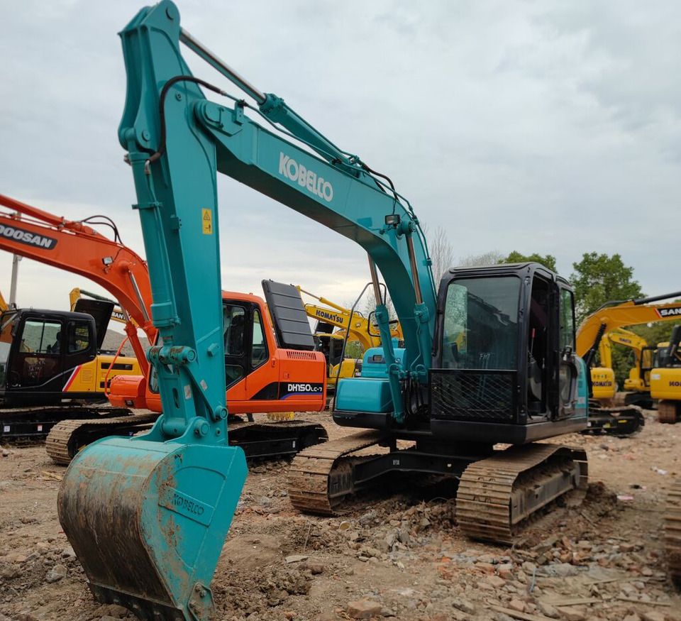 Kobelco SK140-8 crawler excavator, front three-quarter view Kobelco SK140-8 crawler excavator, front three-quarter view