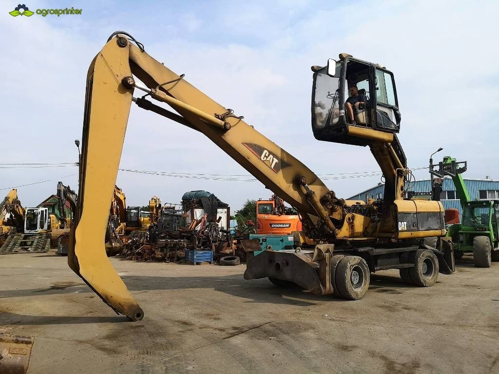 2005 Caterpillar M322C MH material handler, side view