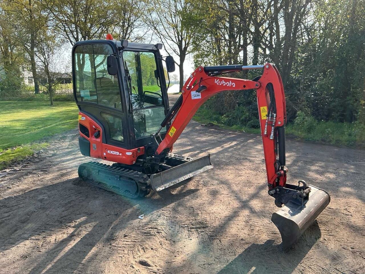 2024 Kubota KX019-4 mini excavator, side view