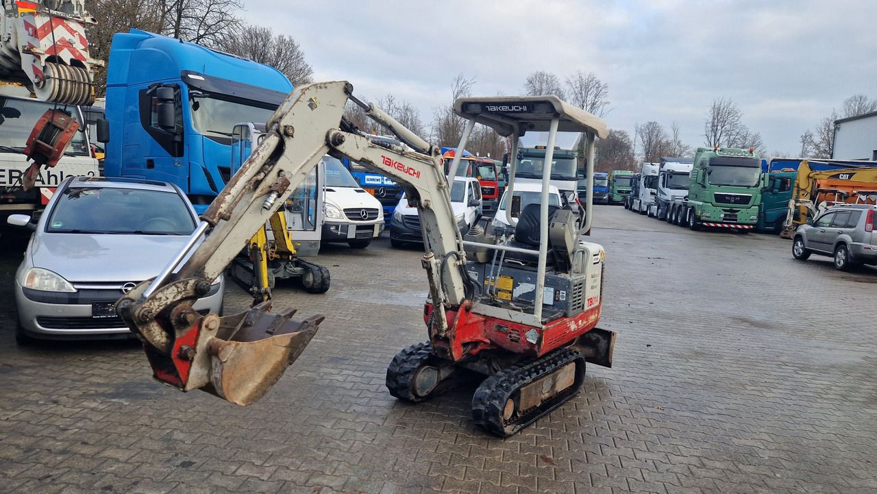 2009 Takeuchi TB014 mini excavator, front three-quarter view 2009 Takeuchi TB014 mini excavator, front three-quarter view