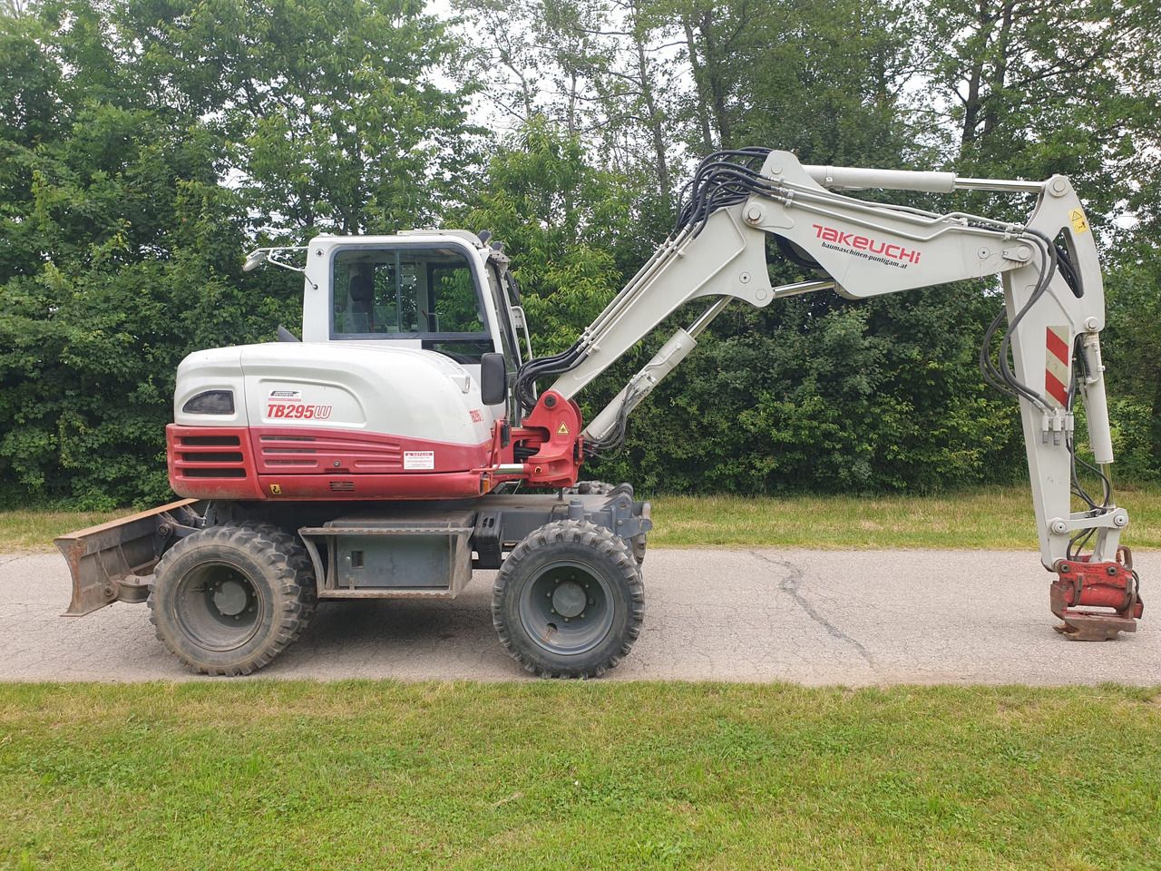 2013 Takeuchi TB295W wheel excavator side view 2013 Takeuchi TB295W wheel excavator side view