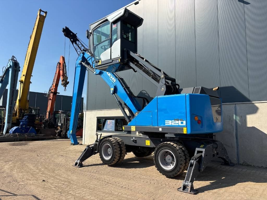 2018 Fuchs MHL320F material handler, rear three-quarter view 2018 Fuchs MHL320F material handler, rear three-quarter view