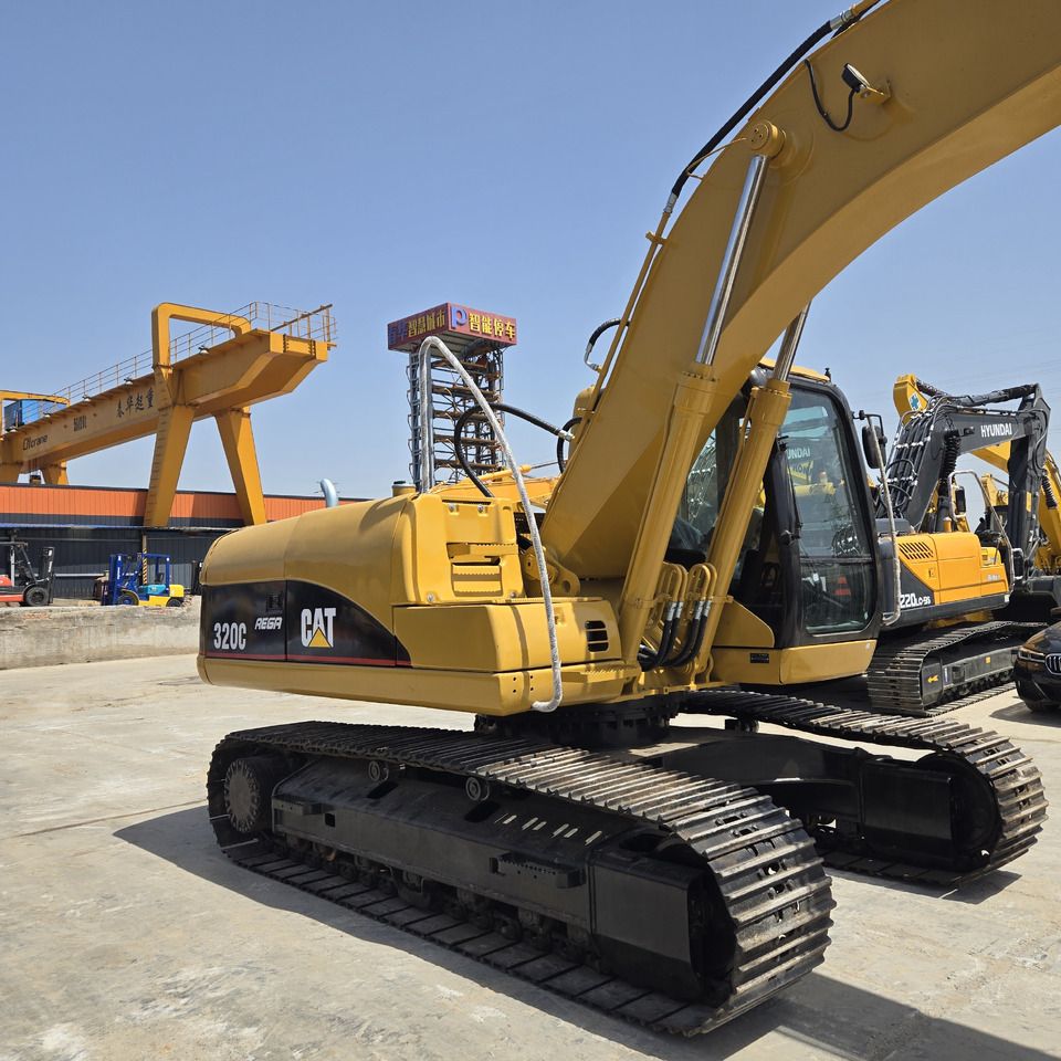 2019 Caterpillar 320C excavator, rear three-quarter view 2019 Caterpillar 320C excavator, rear three-quarter view