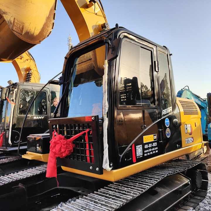 2023 Caterpillar 312D crawler excavator, side view of the cab