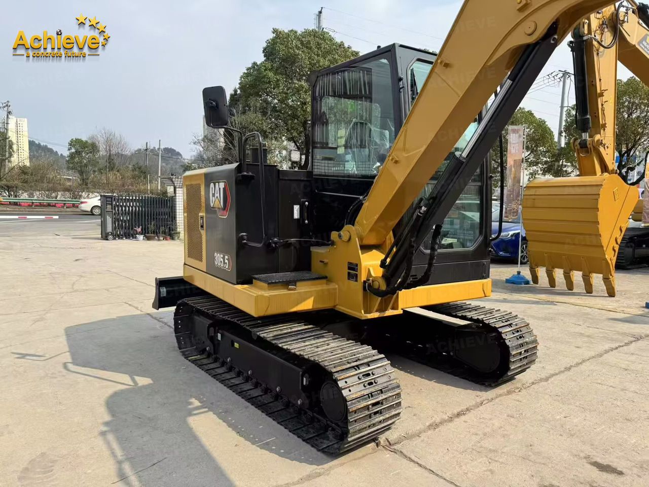 Caterpillar 305.5E2 mini excavator, rear three-quarter view