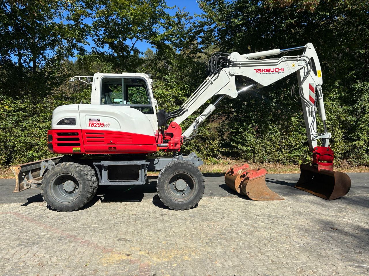 2015 Takeuchi TB295W wheel excavator side view