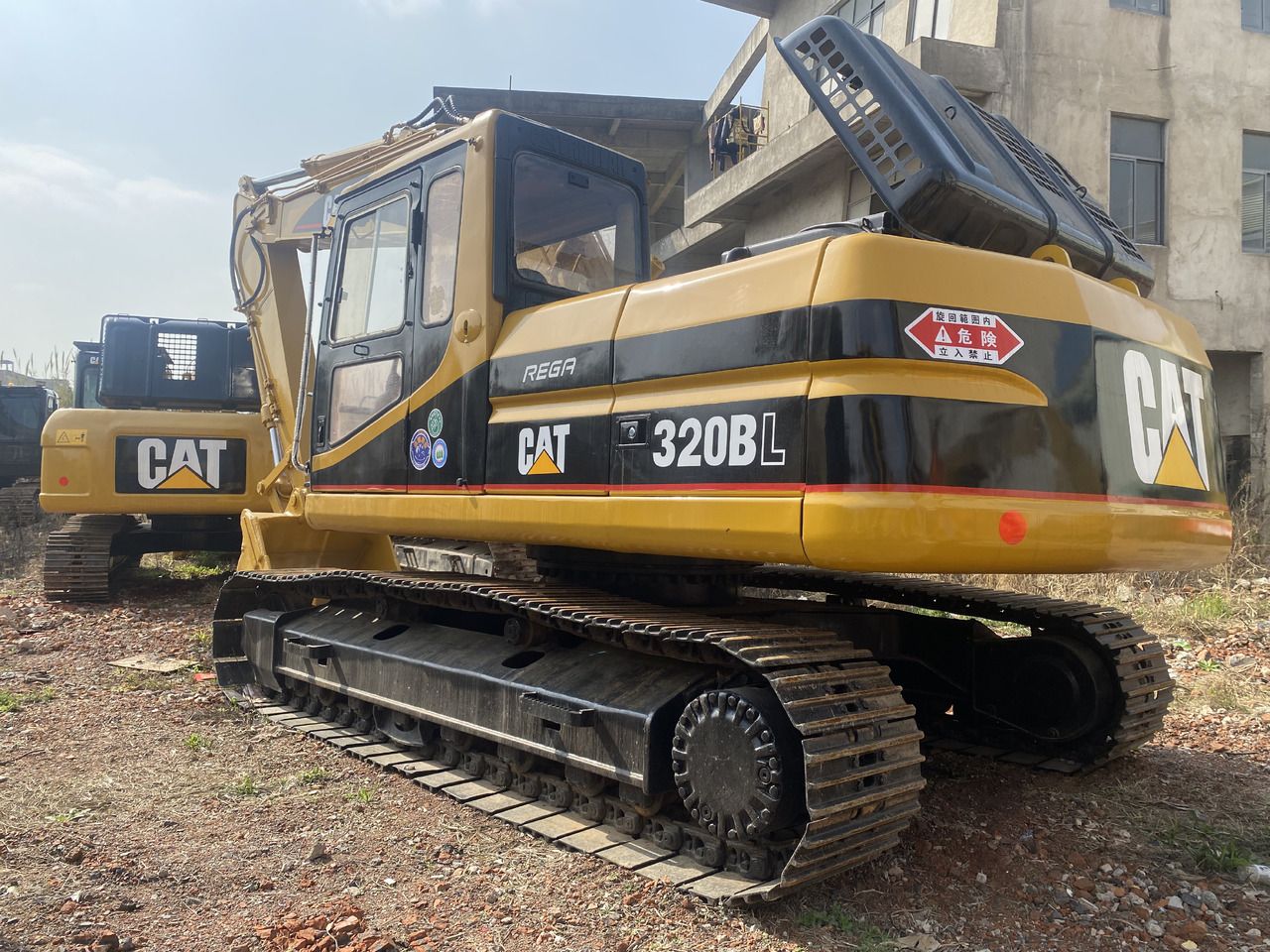 2008 Caterpillar 320BL crawler excavator rear three-quarter view