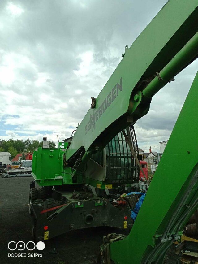 2022 Sennebogen 818-E wheel excavator, side view of boom and cab 2022 Sennebogen 818-E wheel excavator, side view of boom and cab