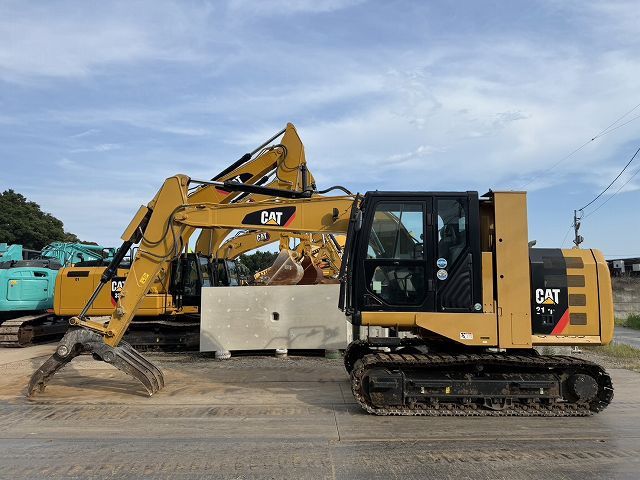 2016 Caterpillar 312E crawler excavator side view 2016 Caterpillar 312E crawler excavator side view