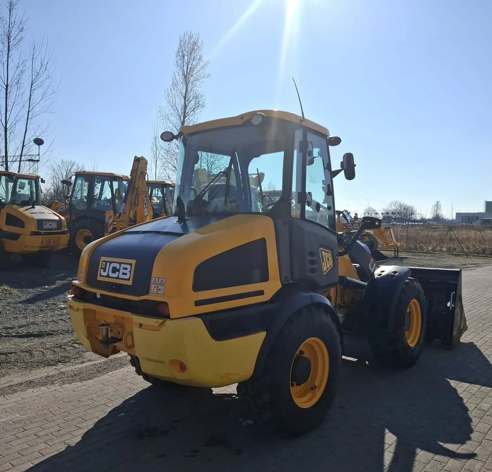 2019 JCB 409 wheel loader, front three-quarter view 2019 JCB 409 wheel loader, front three-quarter view