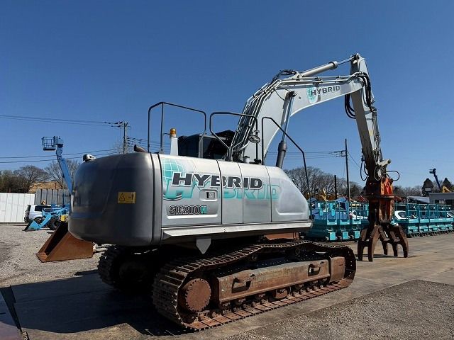 2014 Kobelco SK200H-9 crawler excavator, rear three-quarter view 2014 Kobelco SK200H-9 crawler excavator, rear three-quarter view