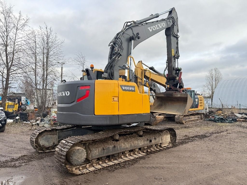 2013 Volvo ECR235 crawler excavator, rear three-quarter view 2013 Volvo ECR235 crawler excavator, rear three-quarter view