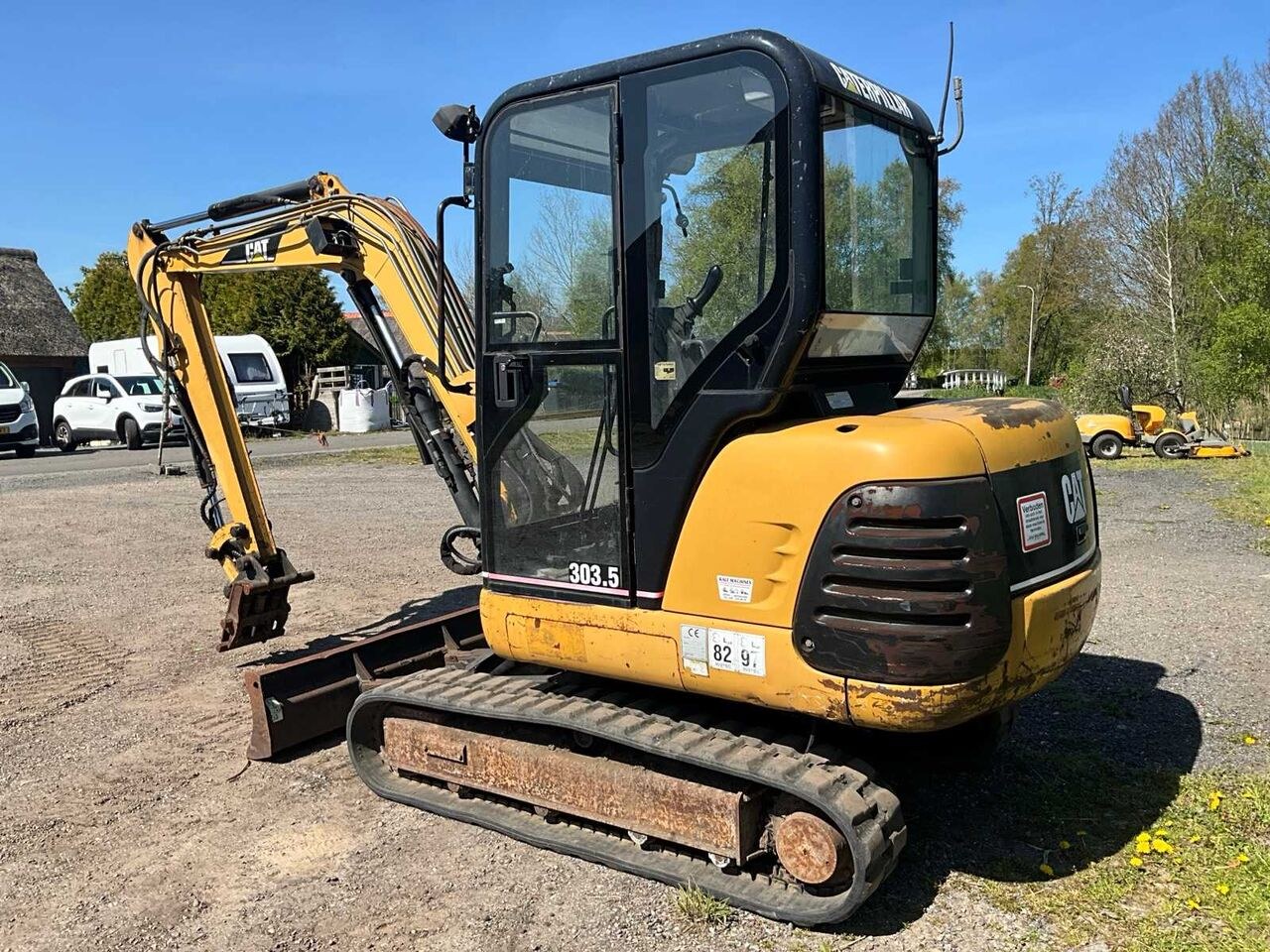 Caterpillar 303.5 mini excavator, rear three-quarter view Caterpillar 303.5 mini excavator, rear three-quarter view