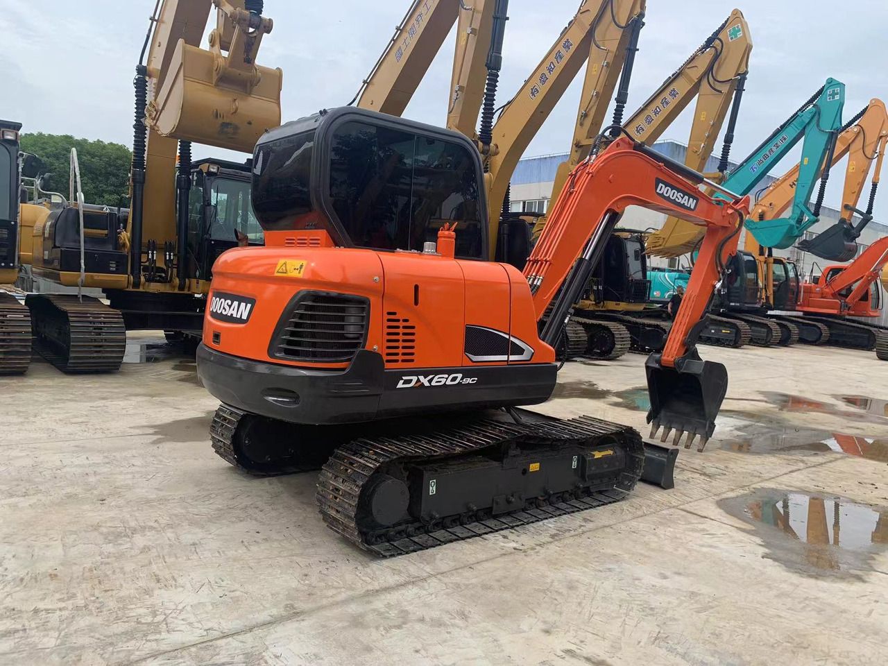 2022 Doosan DX60-9C crawler excavator rear three-quarter view