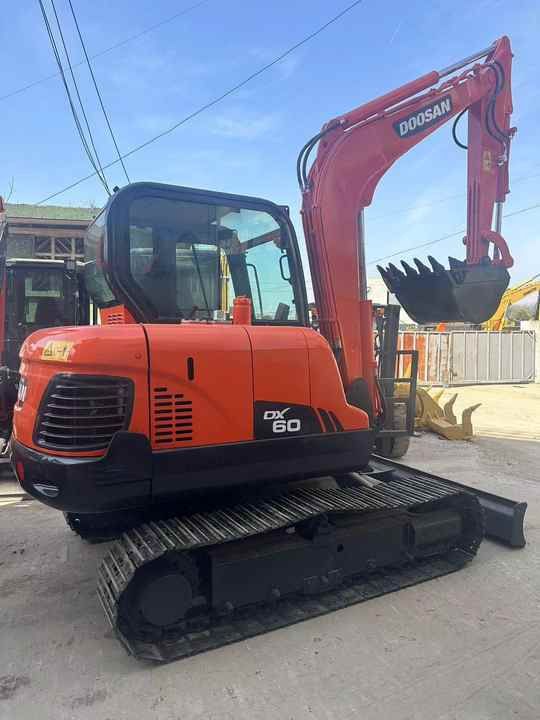 2020 Doosan DX60 crawler excavator, side view 2020 Doosan DX60 crawler excavator, side view