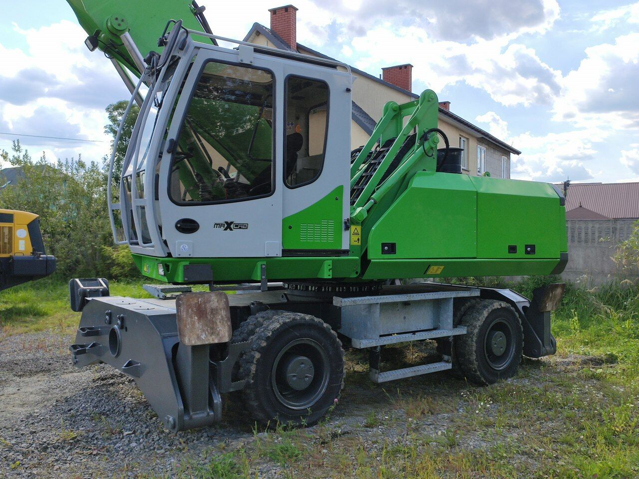 2012 Sennebogen 825 material handler, side view of the cab and upper structure