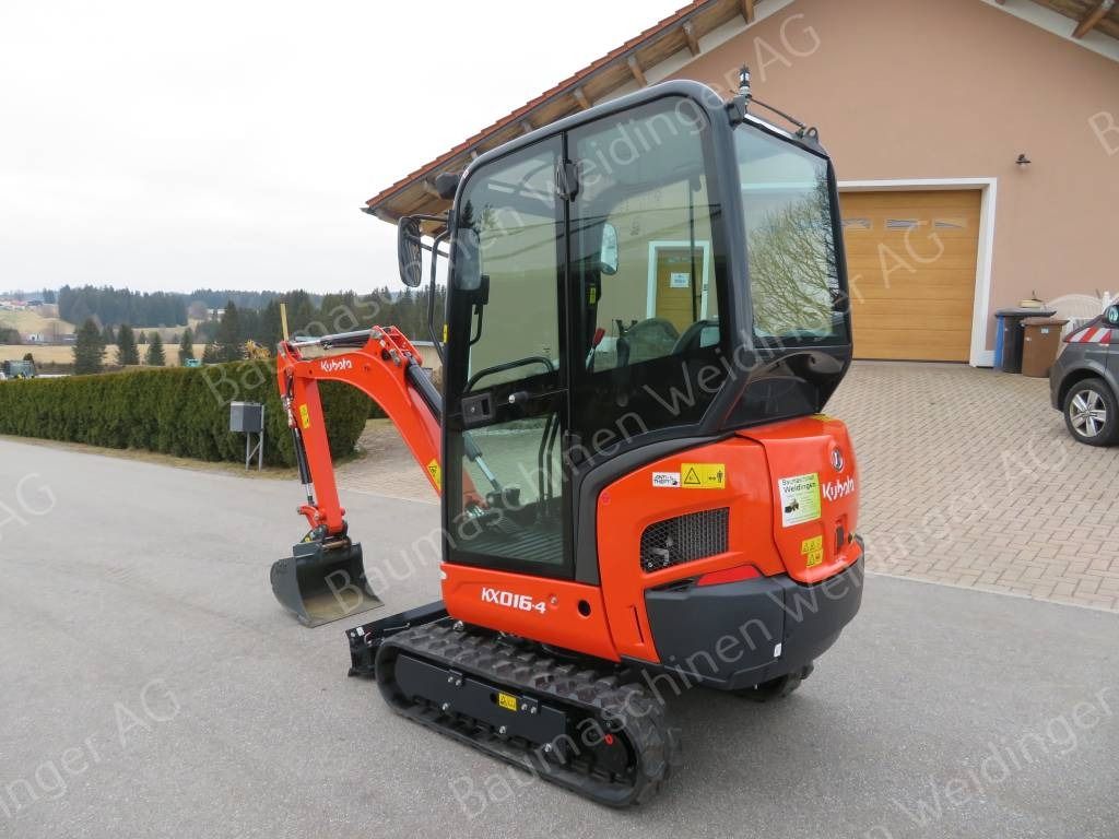 2022 Kubota KX016-4 mini excavator, rear three-quarter view