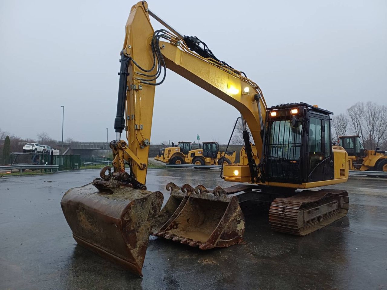 2019 Caterpillar 313F GC crawler excavator, side profile view