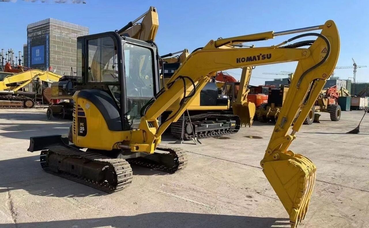Komatsu PC35 mini excavator, front three-quarter view Komatsu PC35 mini excavator, front three-quarter view