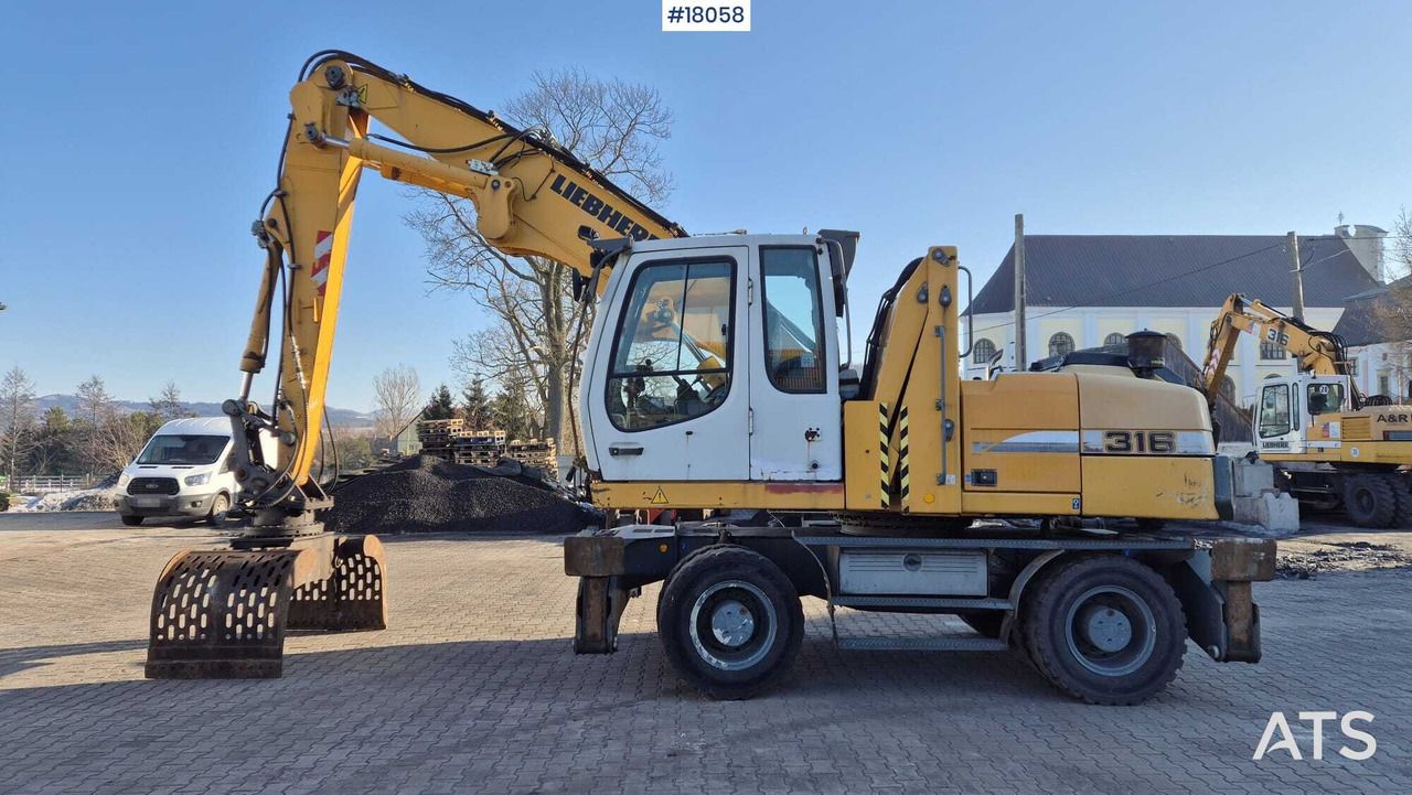 2010 Liebherr A316 LITRONIC material handler, side view 2010 Liebherr A316 LITRONIC material handler, side view