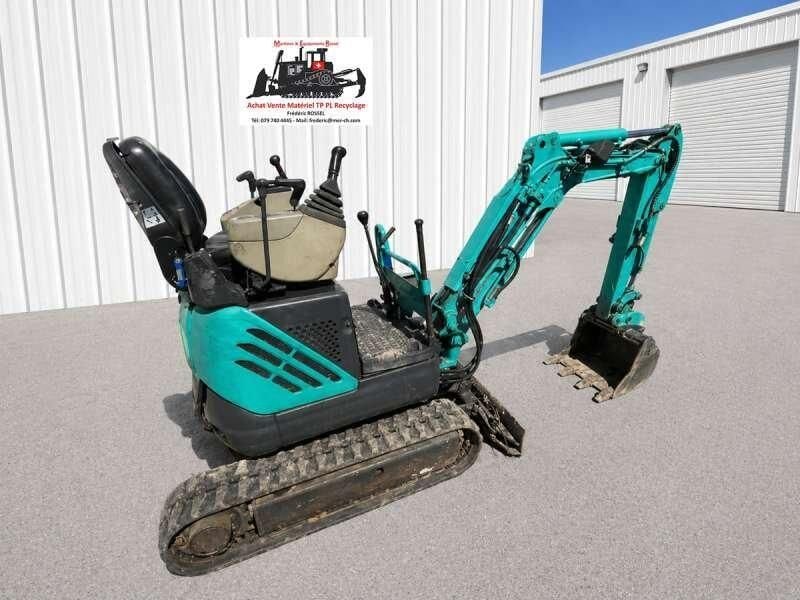2003 Kobelco SK 09 SR mini excavator, rear three-quarter view 2003 Kobelco SK 09 SR mini excavator, rear three-quarter view