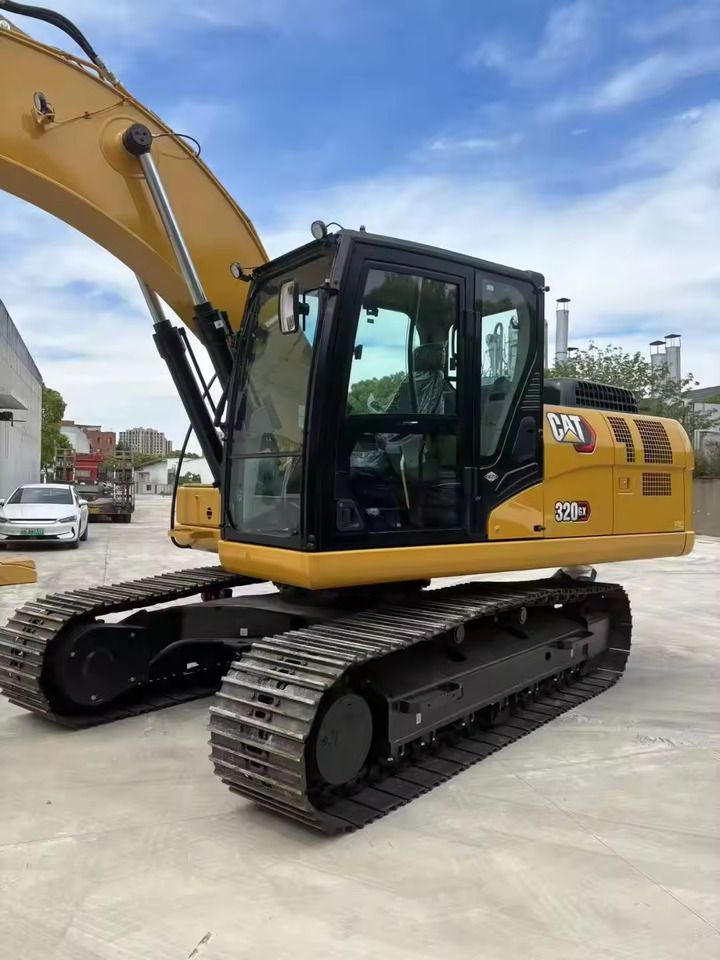 Caterpillar 320GX crawler excavator, side view Caterpillar 320GX crawler excavator, side view