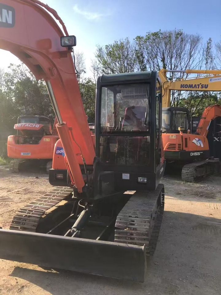 2020 Doosan DX55-9C crawler excavator, front view 2020 Doosan DX55-9C crawler excavator, front view