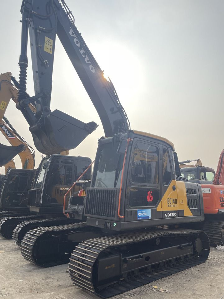 2023 Volvo EC140 crawler excavator, front three-quarter view 2023 Volvo EC140 crawler excavator, front three-quarter view