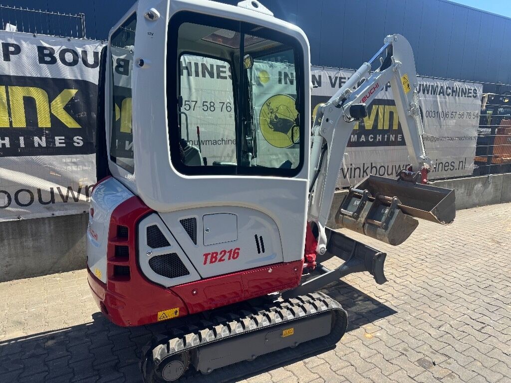 2020 Takeuchi TB216 mini excavator, rear three-quarter view 2020 Takeuchi TB216 mini excavator, rear three-quarter view
