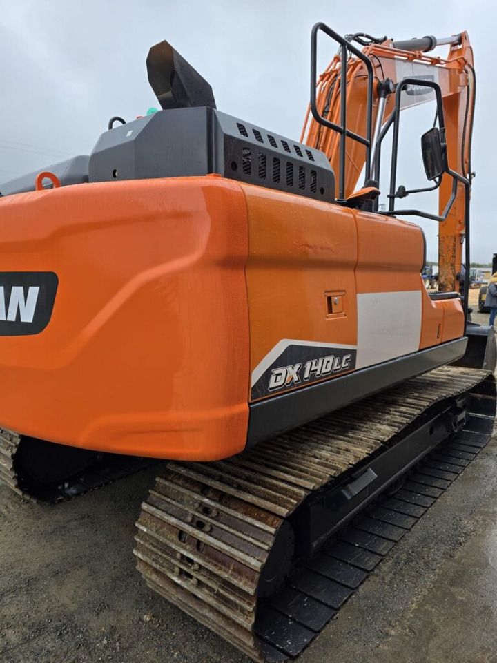 2022 Doosan DX140LC-7 crawler excavator rear three-quarter view 2022 Doosan DX140LC-7 crawler excavator rear three-quarter view