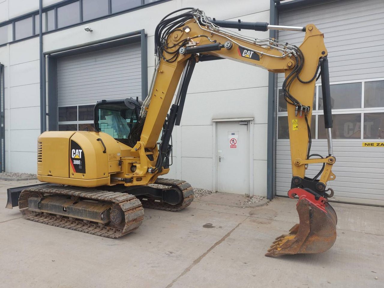 2017 Caterpillar 308E2CR crawler excavator side view 2017 Caterpillar 308E2CR crawler excavator side view