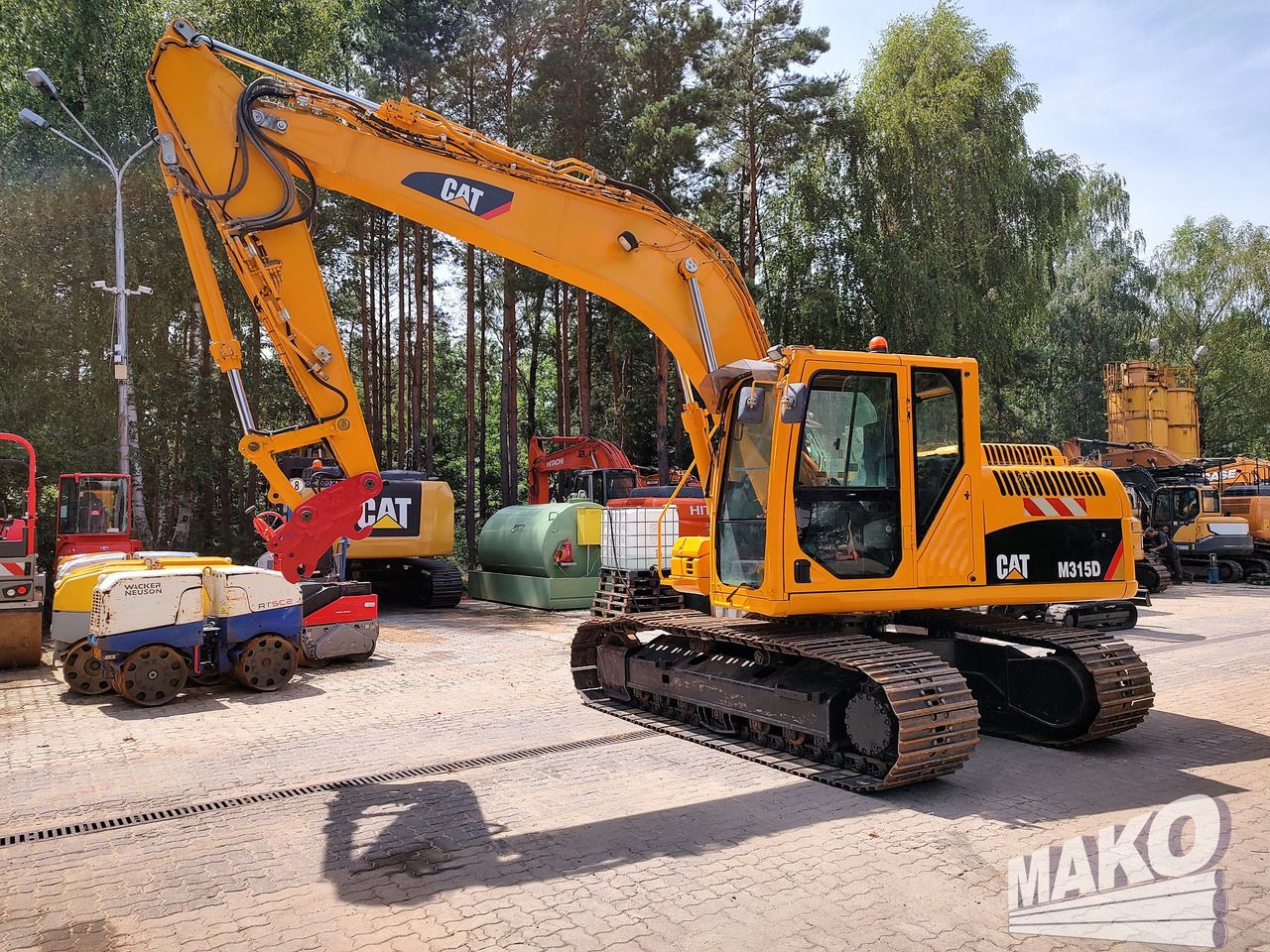 2011 Caterpillar 315D crawler excavator, side view 2011 Caterpillar 315D crawler excavator, side view