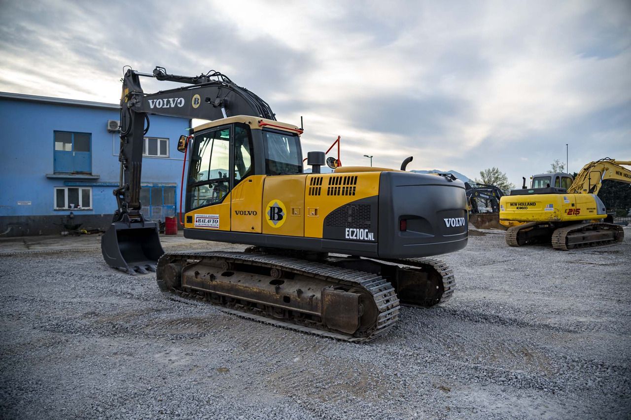 2009 Volvo EC210CNL crawler excavator, rear three-quarter view 2009 Volvo EC210CNL crawler excavator, rear three-quarter view