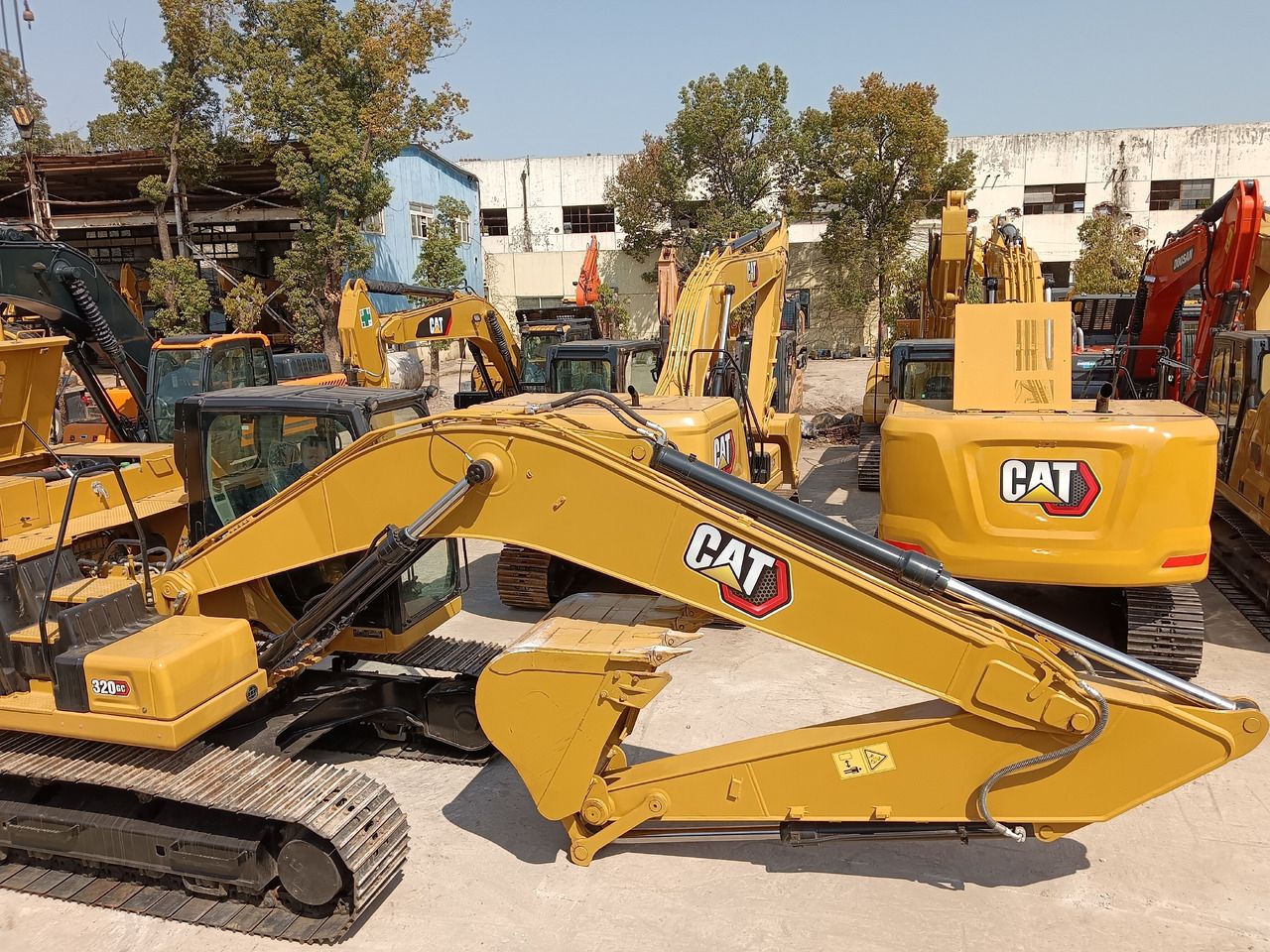 2023 Caterpillar 320GC crawler excavator, side view 2023 Caterpillar 320GC crawler excavator, side view