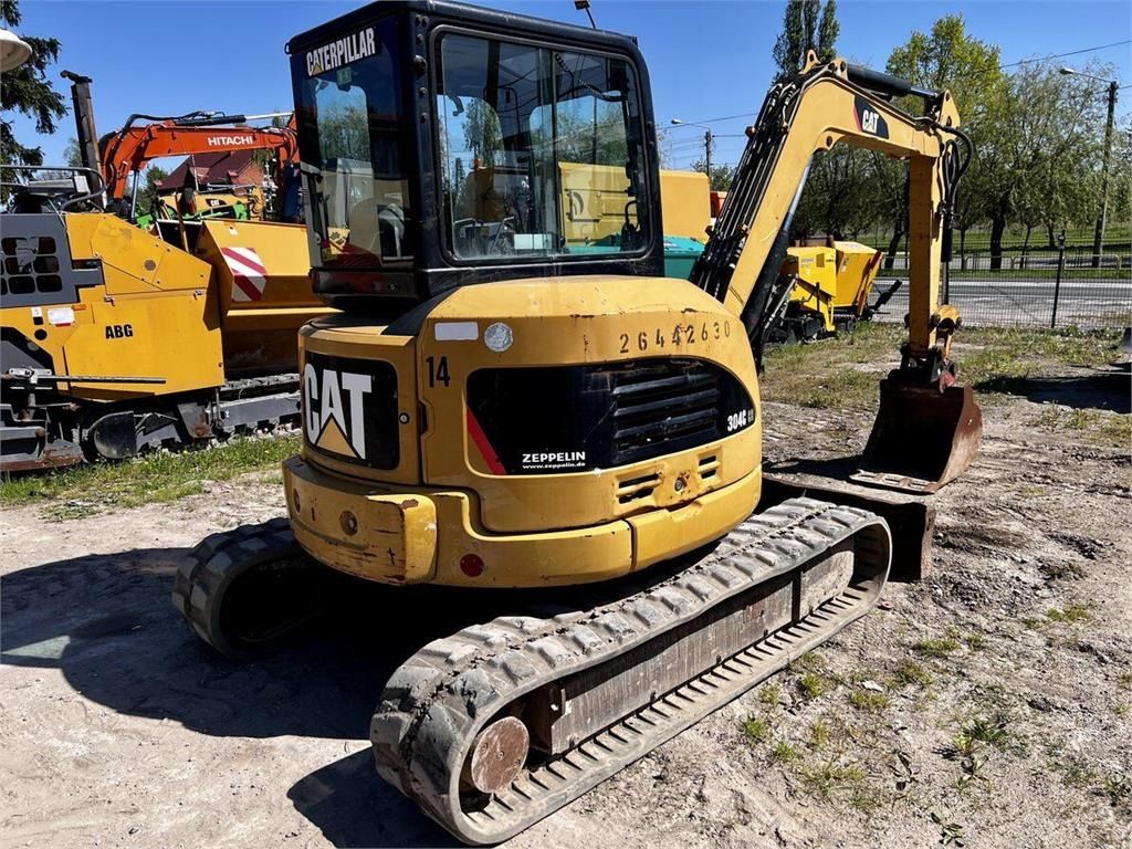 2007 Caterpillar 304CCR mini excavator, rear three-quarter view 2007 Caterpillar 304CCR mini excavator, rear three-quarter view