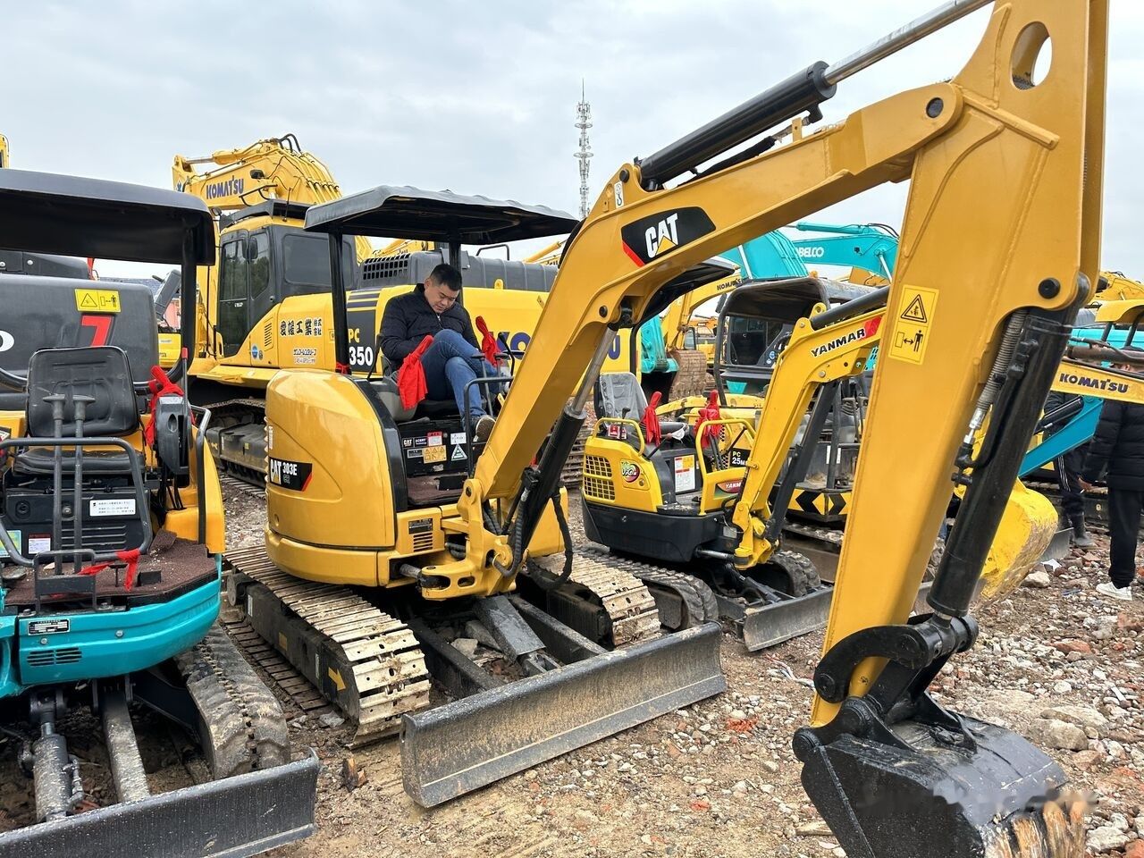 Caterpillar 303E Mini Excavator, side view Caterpillar 303E Mini Excavator, side view