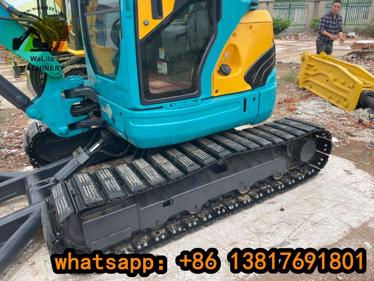 2022 Kubota U55 mini excavator side view 2022 Kubota U55 mini excavator side view