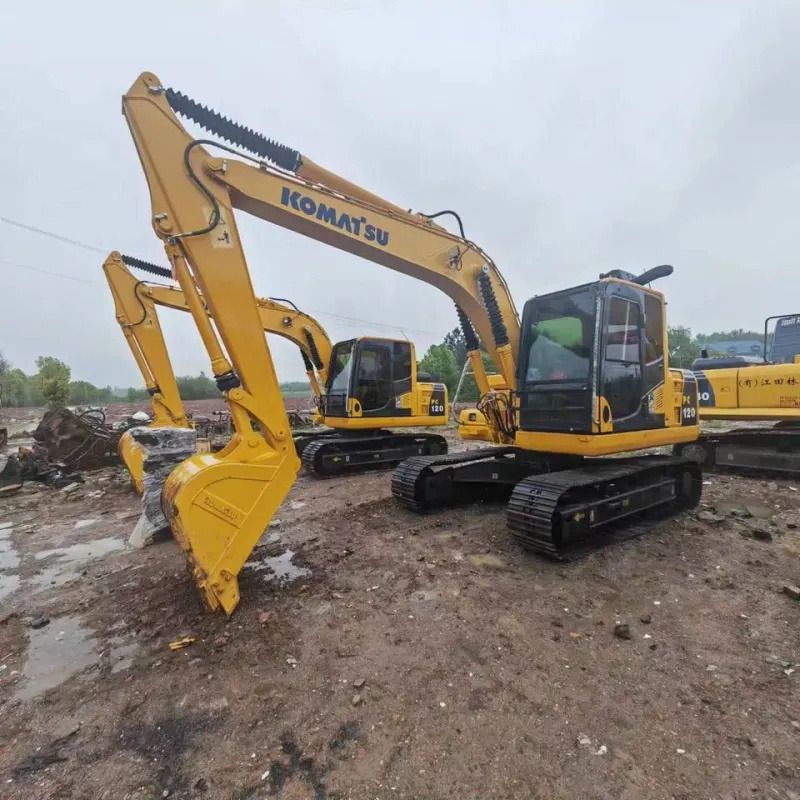 Komatsu PC120-6 crawler excavator, front three-quarter view Komatsu PC120-6 crawler excavator, front three-quarter view