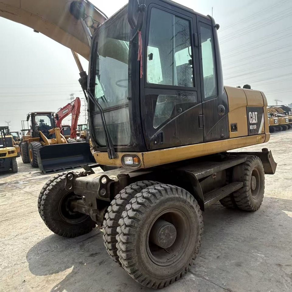 2018 Caterpillar M315D wheel excavator, front three-quarter view 2018 Caterpillar M315D wheel excavator, front three-quarter view