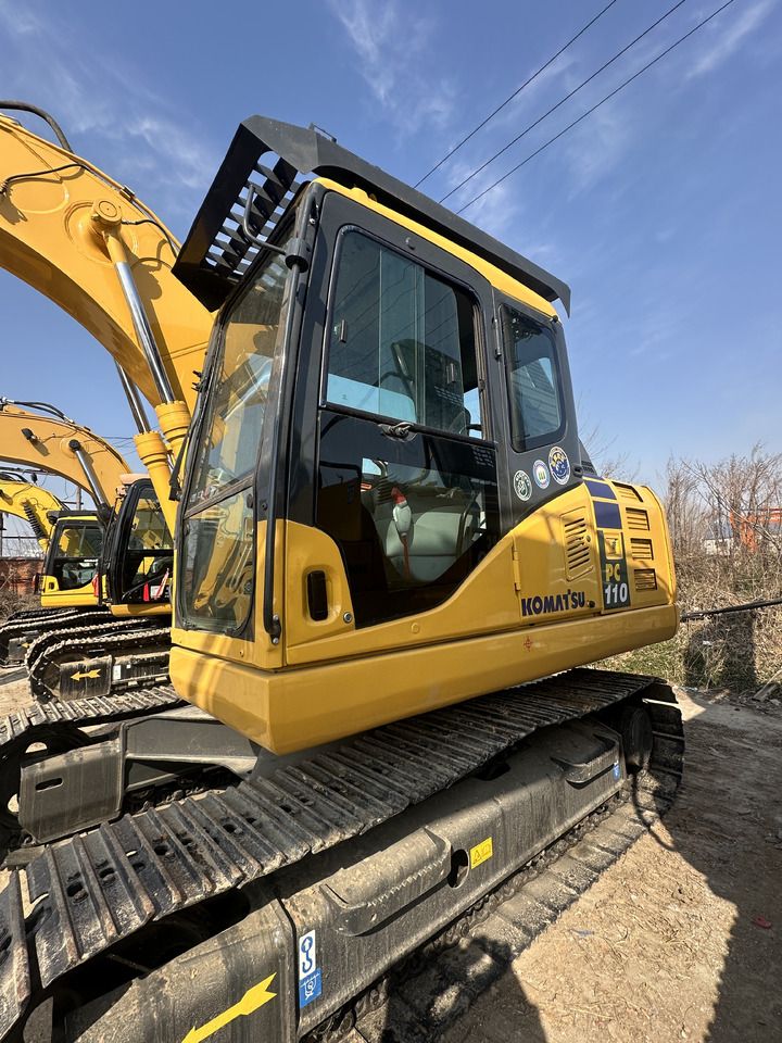 2023 Komatsu PC110-7 crawler excavator, side view of the cab