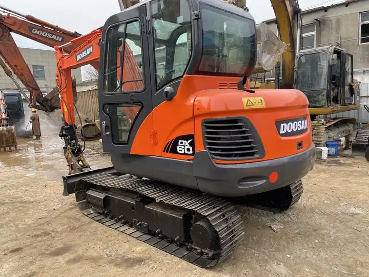 2016 Doosan DX60 crawler excavator, rear three-quarter view 2016 Doosan DX60 crawler excavator, rear three-quarter view