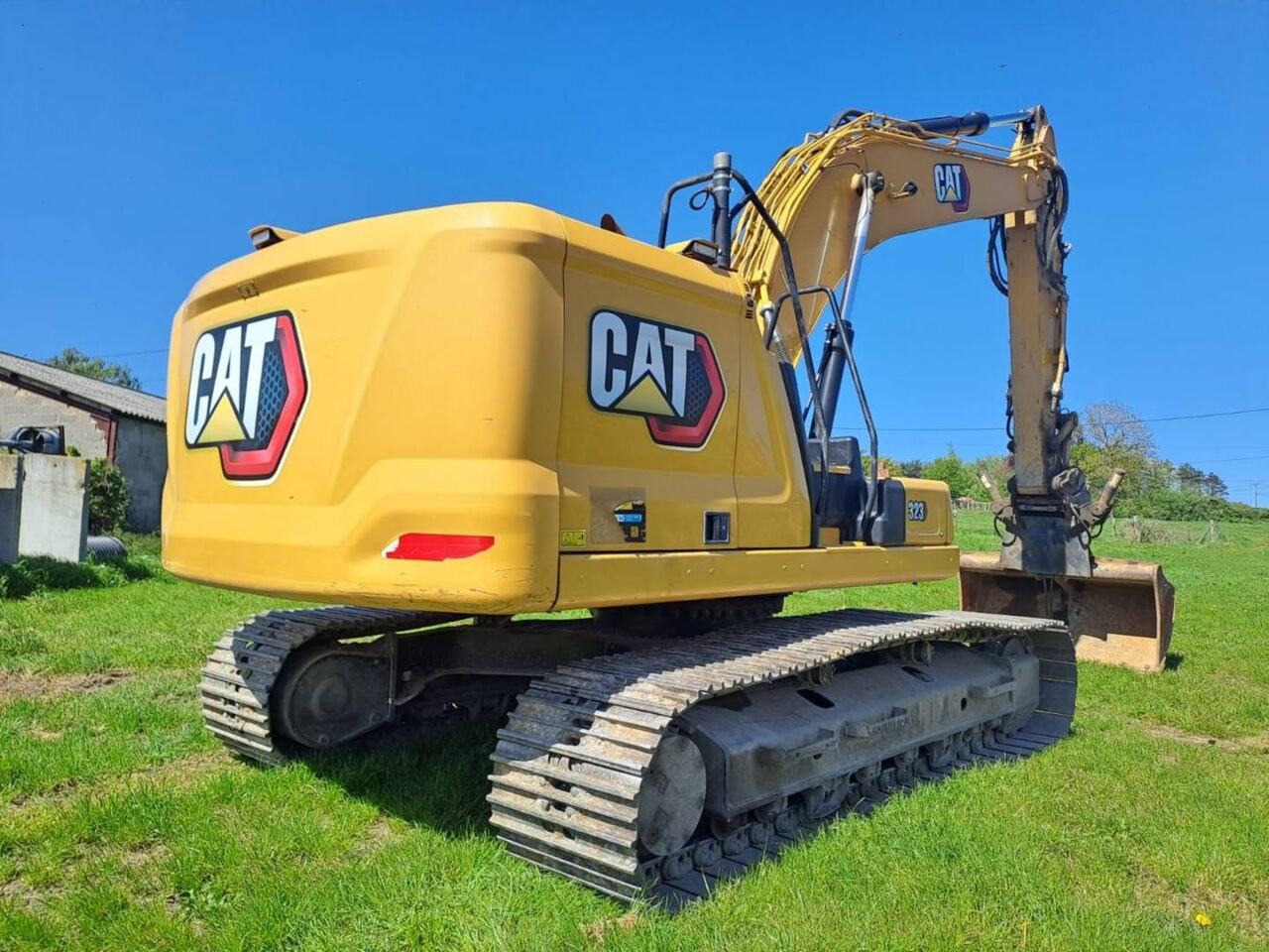 2021 Caterpillar 323-07 crawler excavator, rear three-quarter view 2021 Caterpillar 323-07 crawler excavator, rear three-quarter view