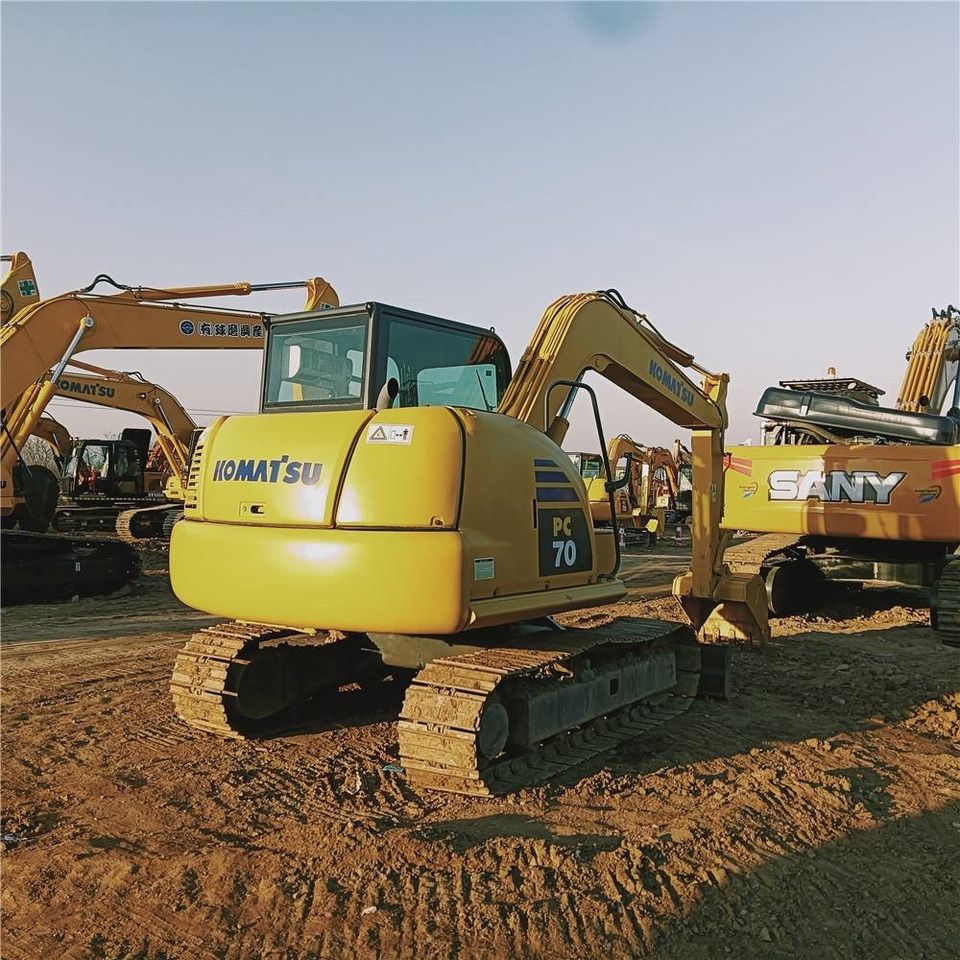 2024 Komatsu PC70-8 mini excavator, rear three-quarter view 2024 Komatsu PC70-8 mini excavator, rear three-quarter view