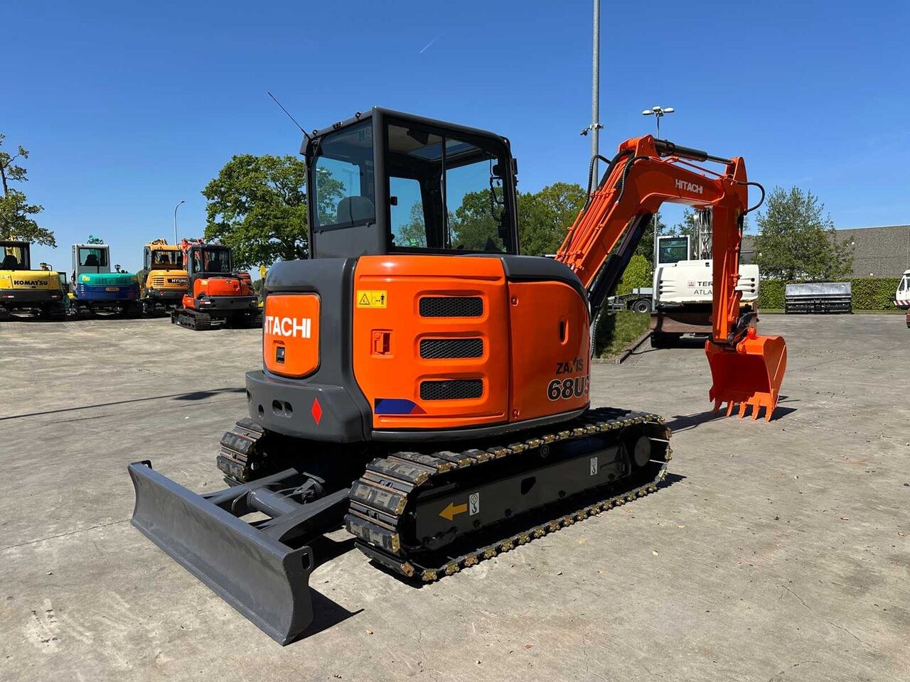 2016 Hitachi Zaxis 68US mini excavator, rear three-quarter view 2016 Hitachi Zaxis 68US mini excavator, rear three-quarter view