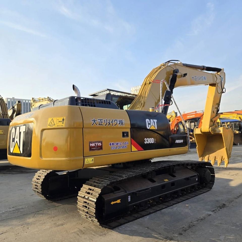 2023 Caterpillar 330D2 excavator, rear three-quarter view 2023 Caterpillar 330D2 excavator, rear three-quarter view