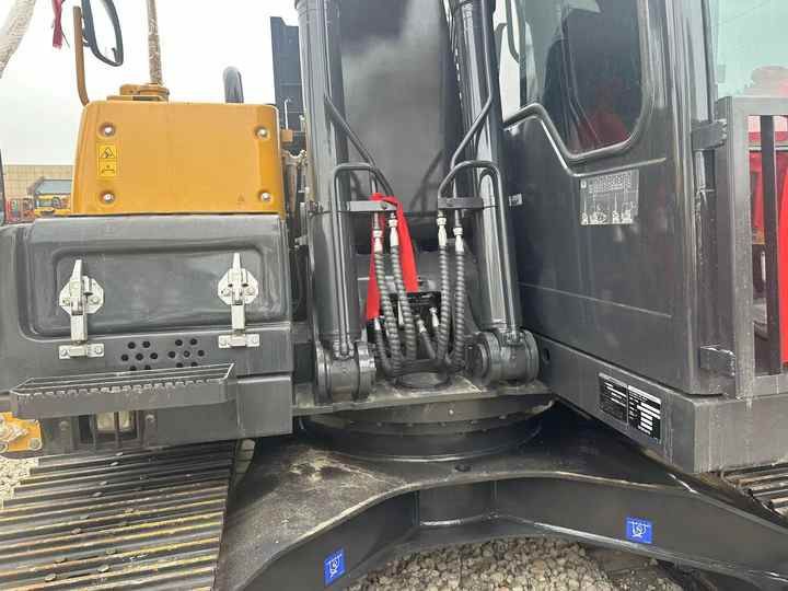 2022 Volvo EC140 crawler excavator side view of cab and boom base 2022 Volvo EC140 crawler excavator side view of cab and boom base